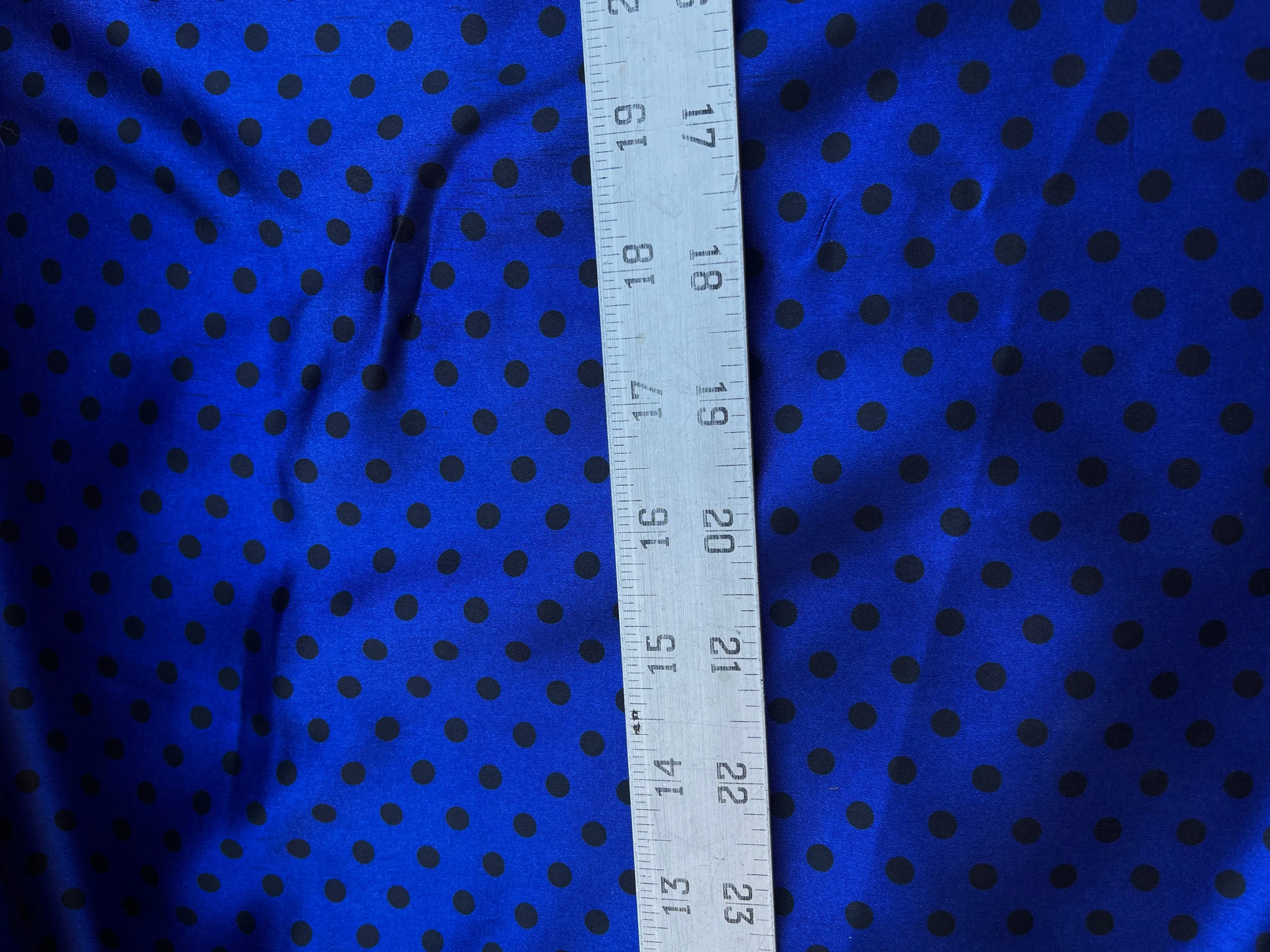 Faux silk charmeuse satin fabric by the yard - black polka dots on Royal Blue